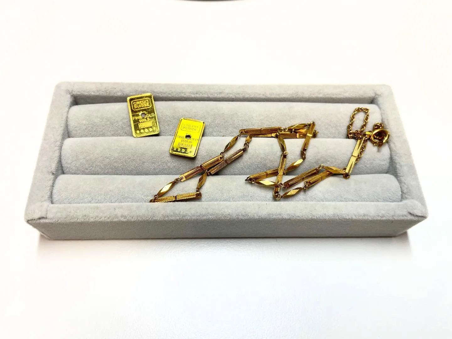 K18のネックレスと、インゴット入りのお時計をお買取しました...